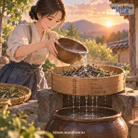 ‘잿물을 내리다’의 첫 번째 뜻을 표현한 그림: 콩깍지나 풋나물 따위의 재를 시루에 안치고 그 위에 물을 부어 잿물이 시루 구멍으로 흘러내리게 하다.