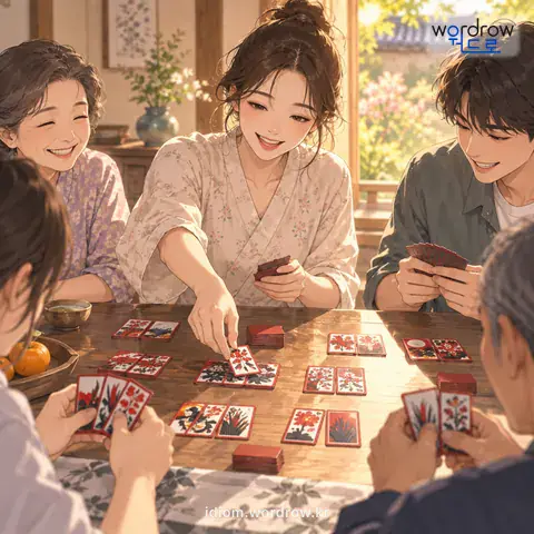‘패를 떼다’의 첫 번째 뜻을 표현한 그림: 골패, 화투 따위를 가지고 패를 맞추어서 나누다.